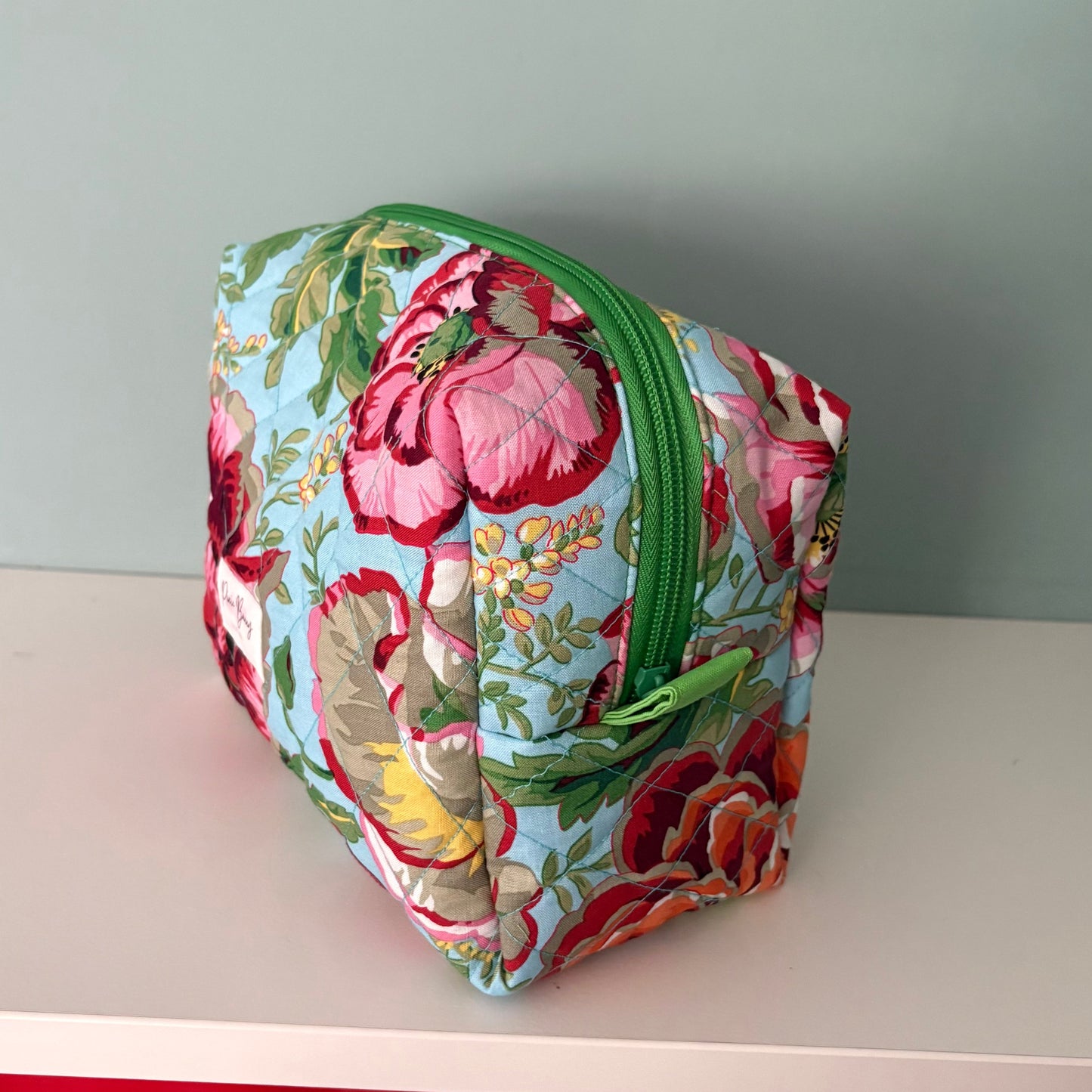 Dorothy's Rose Garden Sky Blue Makeup Bag