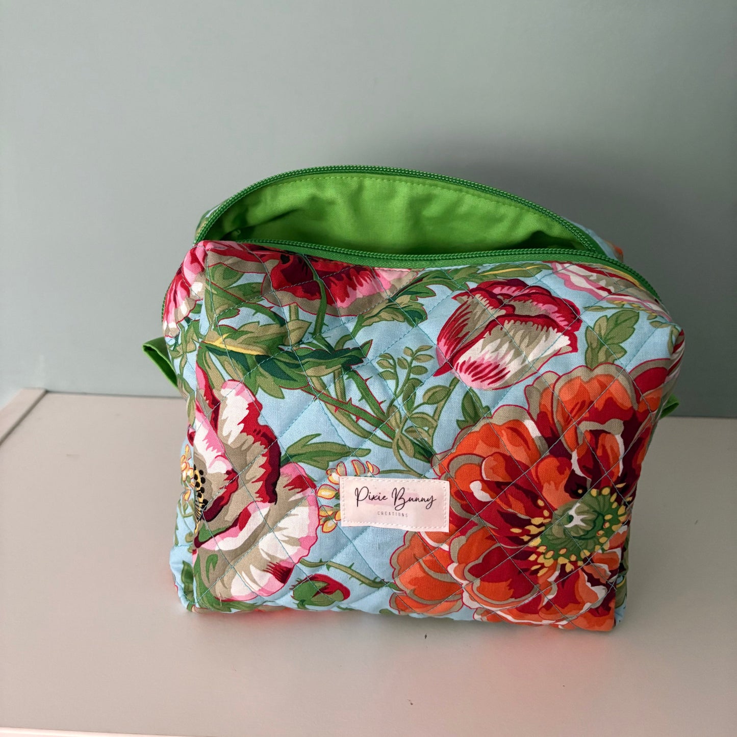 Dorothy's Rose Garden Sky Blue Makeup Bag